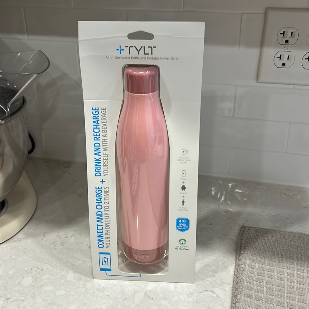 Brand new Tylt pink water bottle
